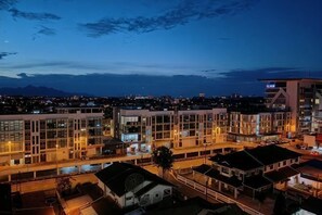 A modern building complex with multiple structures, including a prominent tower and several smaller buildings. - LittleChing @ Armadale Residence Galacity (Kuching)