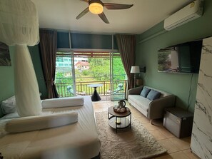 Deluxe Double Room, Balcony, Garden View | Blackout drapes, iron/ironing board, free WiFi