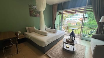 Deluxe Double Room, Balcony, Garden View | Blackout curtains, iron/ironing board, free WiFi