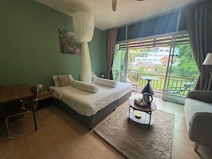 Deluxe Double Room, Balcony, Garden View | Blackout drapes, iron/ironing board, free WiFi