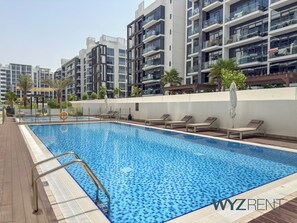 Outdoor pool - Newly Listed Boho Studio Azizi Riviera26 (Dubai)