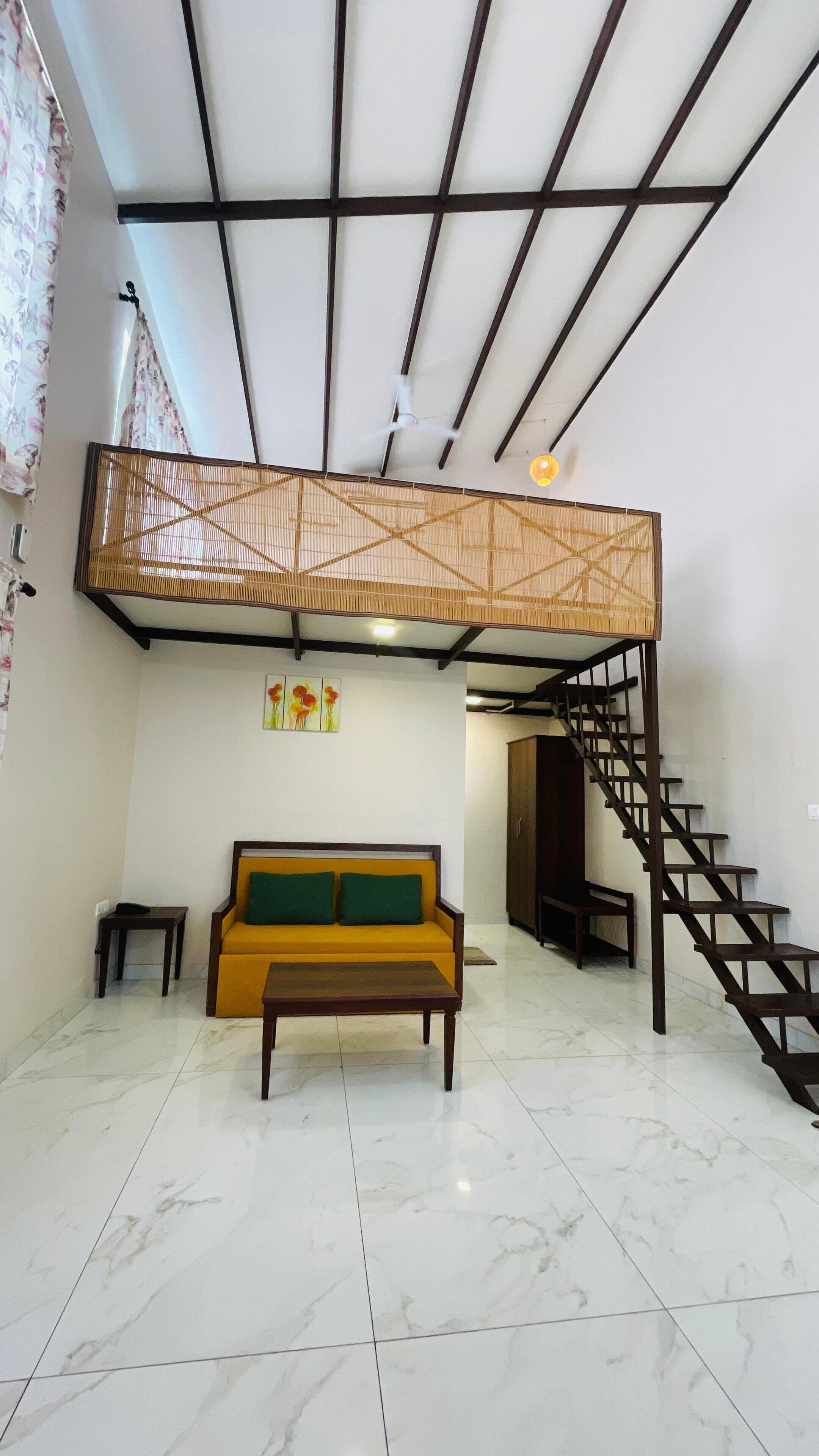 Family Quadruple Room | Living area