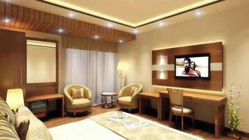 Deluxe kamer, uitzicht op de stad | Een laptopwerkplek, een strijkplank/strijkijzer, gratis wifi