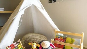 A tent-like structure with a television mounted on the wall above it. - KIN Pool Villa Khaoyai (Pak Chong)