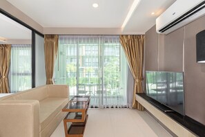 Standard Apartment, Balcony, Pool View | In-room safe, free WiFi