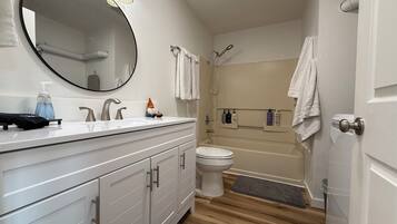 Hair dryer, towels, soap, toilet paper