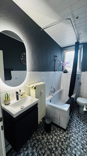 Hair dryer, towels, soap, toilet paper
