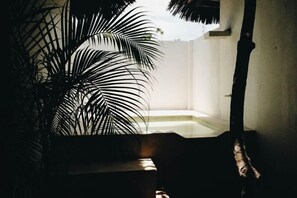 A room with a large window, a white wall, and a potted plant. - Seconda Stella Romantic Hideaway (Kusini)