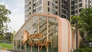 A modern building with a curved facade and large windows. The name "MASTER1 West Heights" is prominently displayed on the front. - Vinhomes Smart City Apartment Ha Noi - BK Homes (Hanoi)