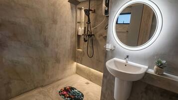 Shower, bidet, towels, soap