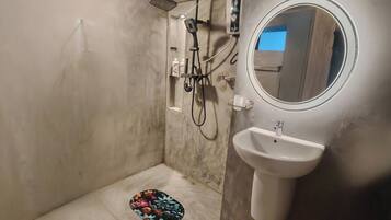 Bidet, towels, soap, toilet paper