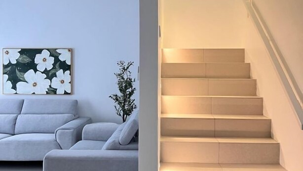 A modern living room with a grey sofa and a floral painting on the wall. - T2 House Kuantan (Kuala Kuantan)