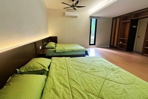 A hotel room with two beds, a ceiling fan, and a large window. - The Luxurious 231, Lake House Villa (Pegoh)