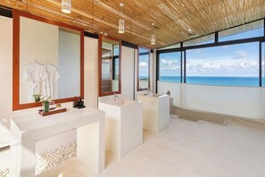 A modern bathroom with three sinks, large mirrors, and a view of the ocean. - Jasmine Waterslide 5BR Pool Villa (Koh Samui)
