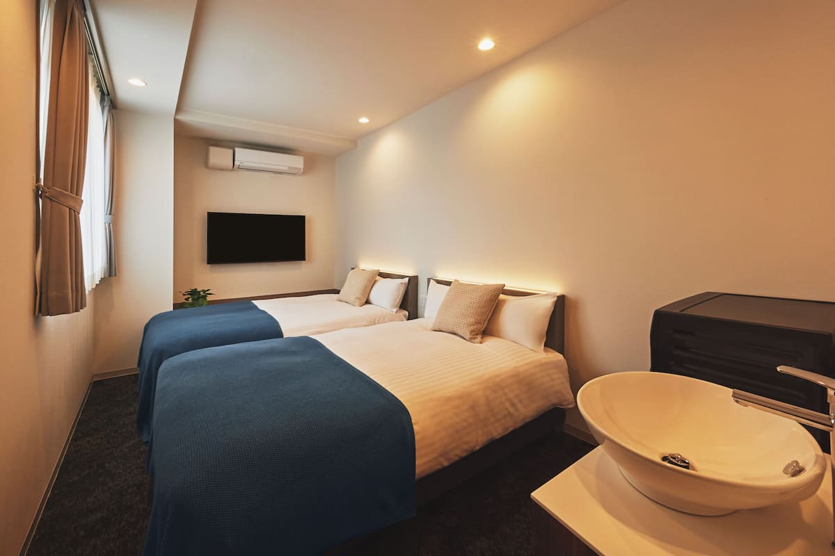 Desk, blackout curtains, free WiFi, bed sheets