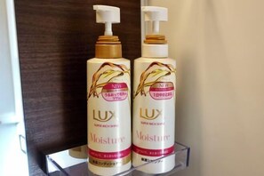 Two bottles of Lux Moisture on a clear shelf. - 5 minutes from Shijo Omiya Station, in the center of Kyoto, a rental group (Kyoto)