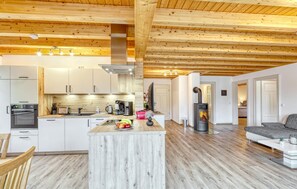 Fridge, stovetop, dishwasher, coffee/tea maker