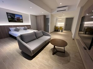 Chambre Deluxe Double ou avec lits jumeaux | Bureau, fer et planche à repasser, Wi-Fi gratuit