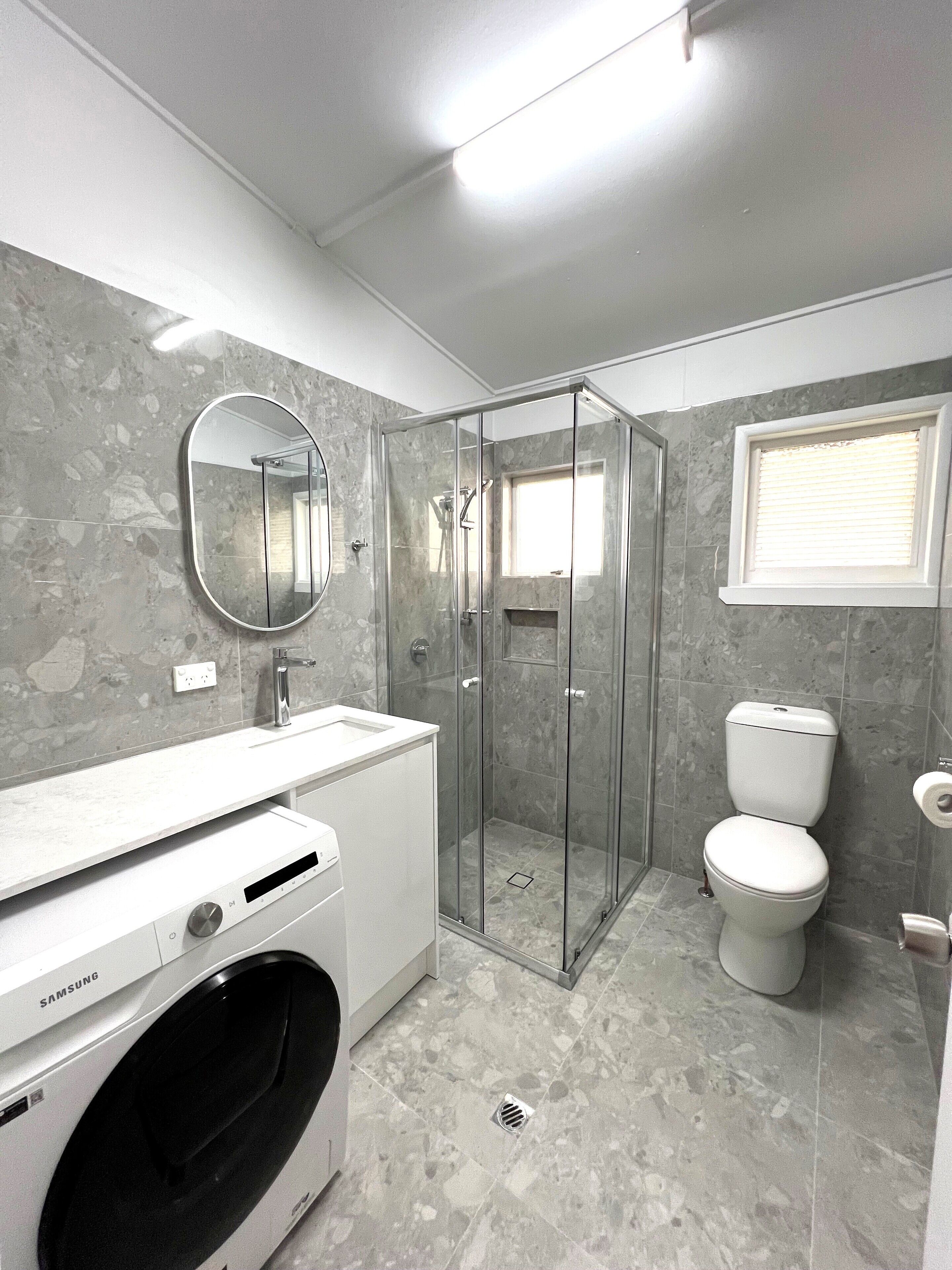 Shower, hair dryer, towels, toilet paper