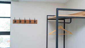 A room with a bunk bed, a coat rack, and a window. - Swing & Pillows @ Seri Kembangan (Balakong)