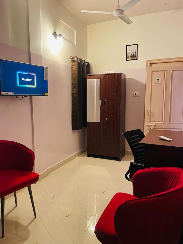 Doppia Deluxe, vista città | Area soggiorno