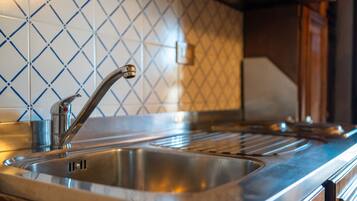 Fridge, stovetop, cookware/dishes/utensils