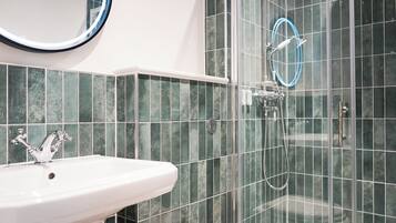 Shower, towels, soap, shampoo