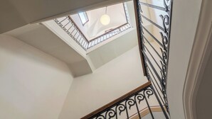 A view of a staircase with a metal railing and a skylight above. - Il forno antico - One Bedroom Apartment, Sleeps 4 (Lecce)
