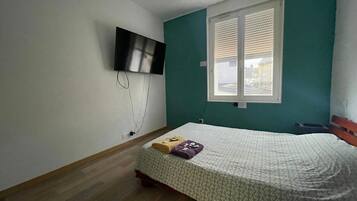 1 bedroom, travel crib, WiFi, bed sheets