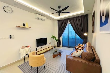 Living area. Elegant 3-Bedroom Fully Air-Con @ Vista Sentul