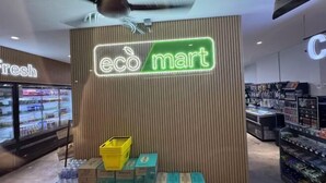 An eco-friendly store named 'eco mart' with a wooden panel wall and a ceiling fan. - Elegant 3-Bedroom Fully Air-Con @ Vista Sentul (Kuala Lumpur)
