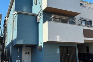 A multi-story residential building with a balcony on the second floor. - Lapis House 201-2F (Tokyo)