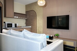 Suite Studio, vue ville | Coffres-forts dans les chambres, fer et planche à repasser