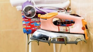 An ironing board with an iron and a hairdryer. - Seremban-Spacious-Lovely-Home-Bkt Chedang-S2-10R4B (Seremban)