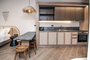 Deluxe Studio, Balcony, Sea View | Private kitchen | High chair