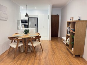 Dining - Stylish 2-bed coastal apartment near beach & marina – perfect for relax or work. (Soldiers Point)