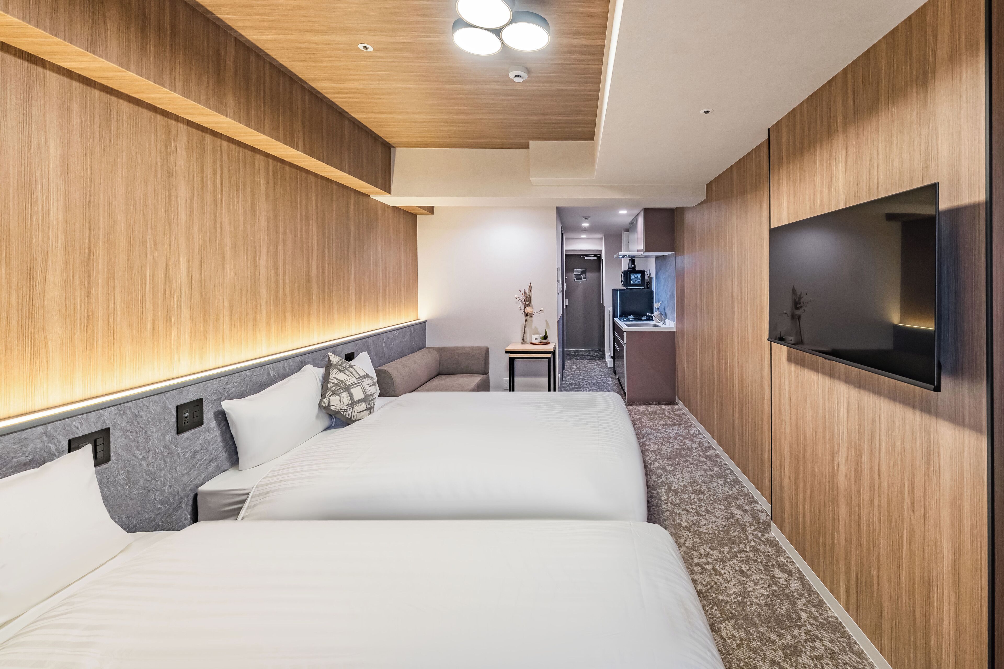 Chambre quadruple Standard, 2 lits doubles, non-fumeur | Rideaux d’obscurcissement, accès au Wi-Fi (inclus), literie fournie