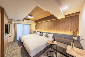 Chambre quadruple Standard, 2 lits doubles, non-fumeur | Rideaux d’obscurcissement, accès au Wi-Fi (inclus), literie fournie