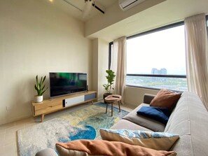 Comfort Apartment, City View | Living area | Flat-screen TV - Tamarind Luxury Condo by Smarthome (Cyberjaya)