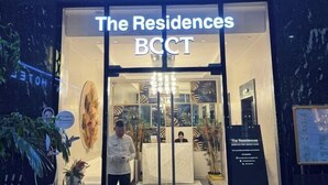 A hotel entrance with a sign reading "The Residences BCCT". - Cozy 1 Studio - The Residences BGC Taguig (Taguig)