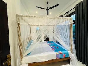 Deluxe Double Room, Balcony, Garden View | In-room safe, desk, laptop workspace, soundproofing