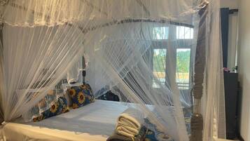 Deluxe Double Room, Balcony, Garden View | In-room safe, desk, laptop workspace, soundproofing