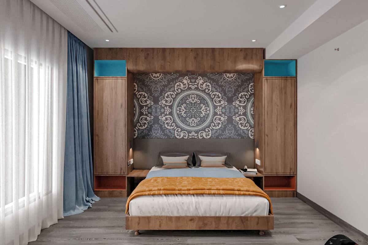 A modern bedroom with a large bed, wooden headboard, and a decorative tapestry.