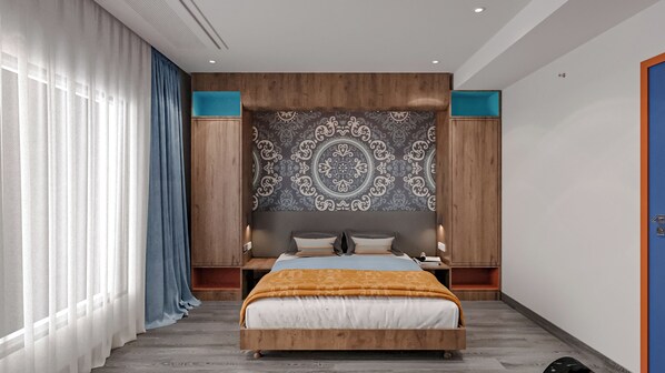Zone Deluxe | Premium bedding, in-room safe, blackout drapes, iron/ironing board