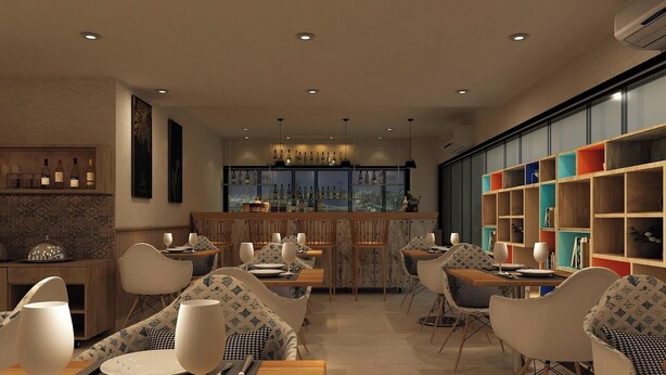 A modern dining area with a bar, seating, and a view of the city. - Zone by The Park New Market Kolkata (Kolkata)