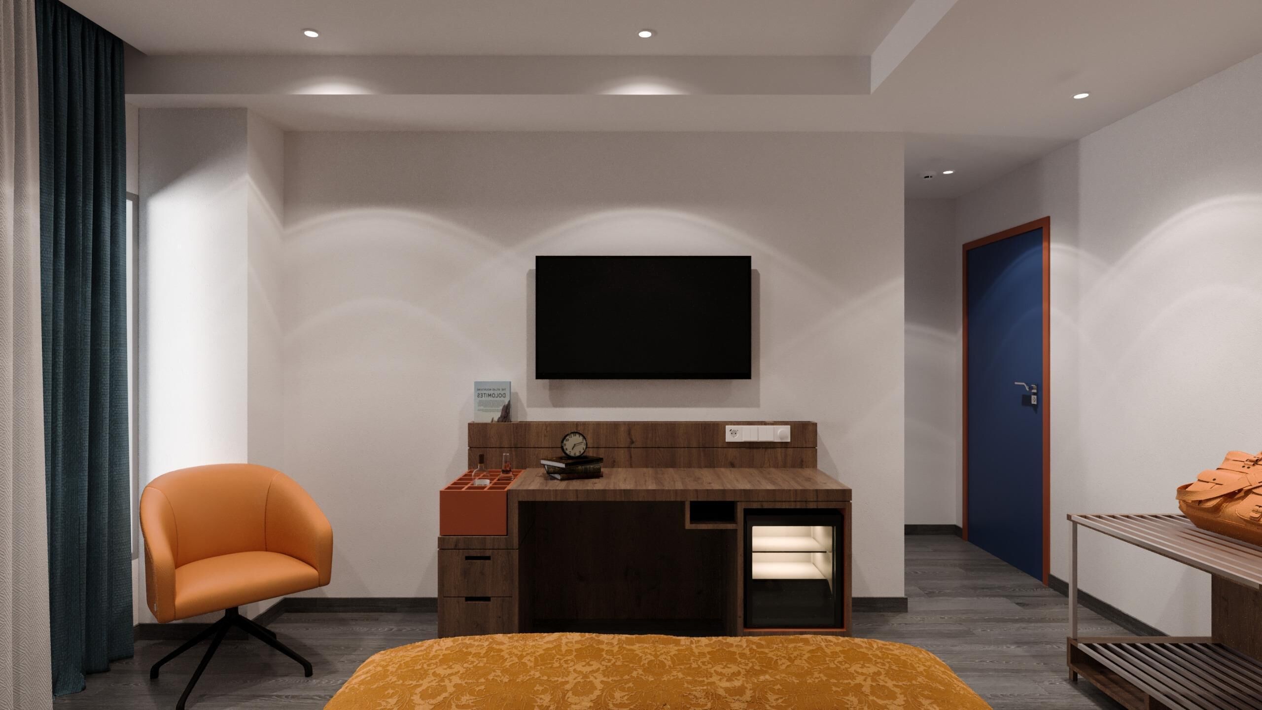 A modern bedroom with a single bed, a desk with a chair, a TV mounted on the wall, and a door.