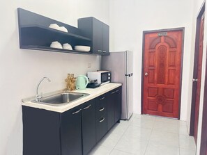 Comfort Suite, Patio, Courtyard View | Private kitchen - Plan B house (Patong)