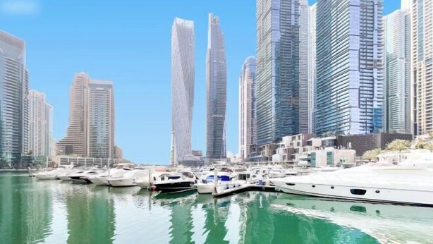 A marina with several yachts docked, surrounded by high-rise buildings.
