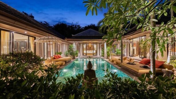 A luxurious pool area with a statue, surrounded by lush greenery and modern outdoor furniture. - Balinese 2 Bedroom Private Pool Villa (Kbr11) (Koh Samui)