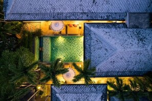 An aerial view of a resort with a swimming pool, lounge area, and a covered deck. - Balinese 2 Bedroom Private Pool Villa (Kbr11) (Koh Samui)